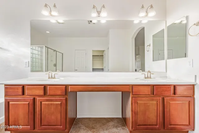 a bathroom with a shower and a bathtub