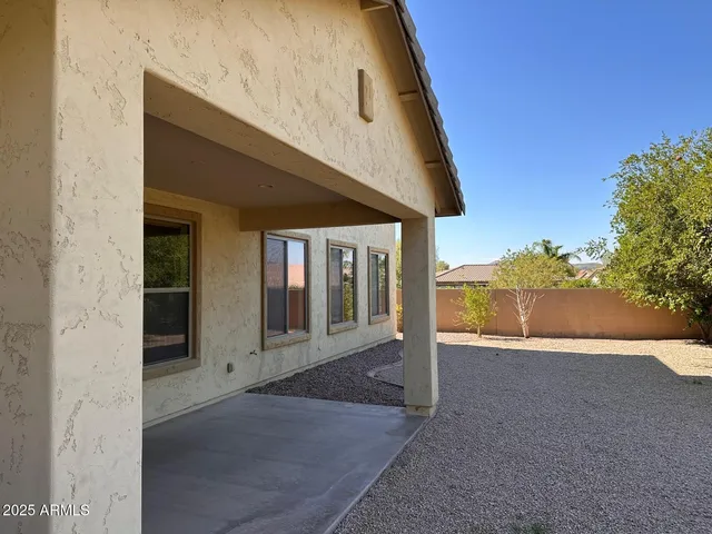 a view of a house with a small yard