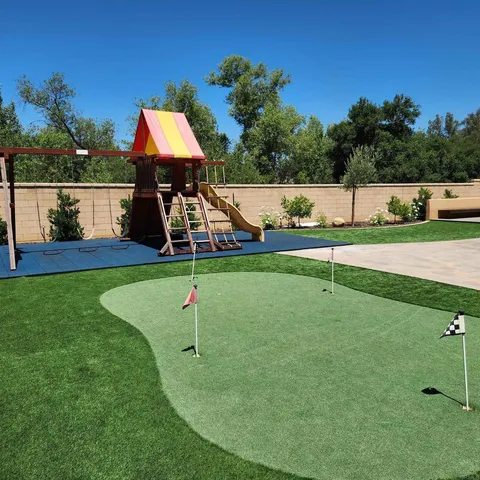 a view of a golf course with a slide