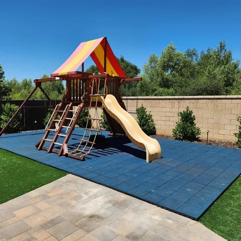 a view of swimming pool with seating space