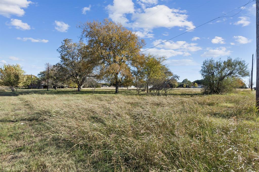 725 Stinson Road Lucas, TX 75002 - Photo 13 of 28 a view of outdoor space with deck and yard