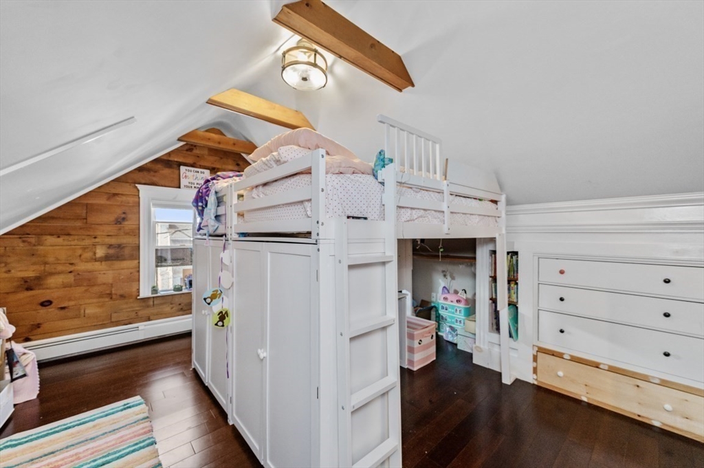 58-60 Cabot Street Everett, MA 02149 - Photo 17 of 39 a view of a room with wooden floor