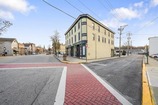 a view of a building with a street