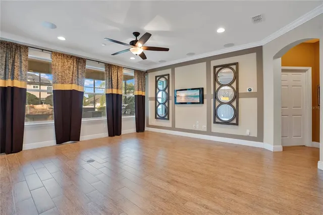 a bathroom with a sink a large mirror and a bathtub