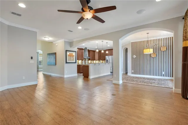 a bathroom with a granite countertop sink mirror and bathtub