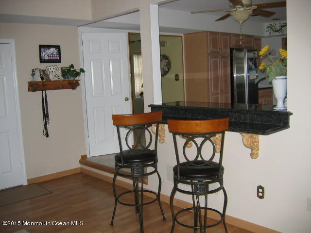 15 Remsen Drive Howell, NJ 07731 - Photo 7 of 19 Breakfast bar open to the family room