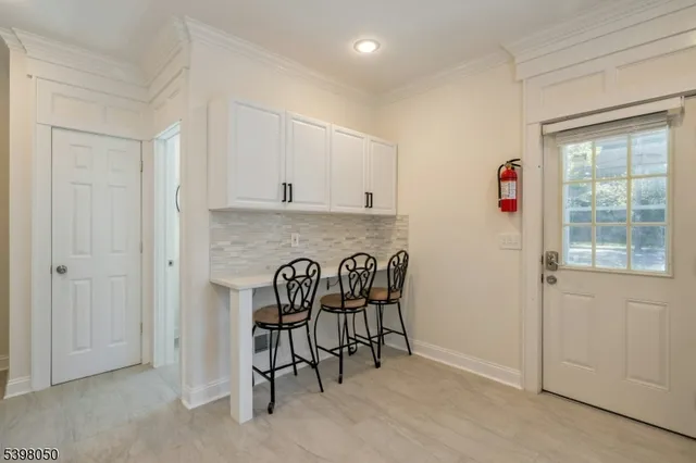 a view of a livingroom with furniture and window