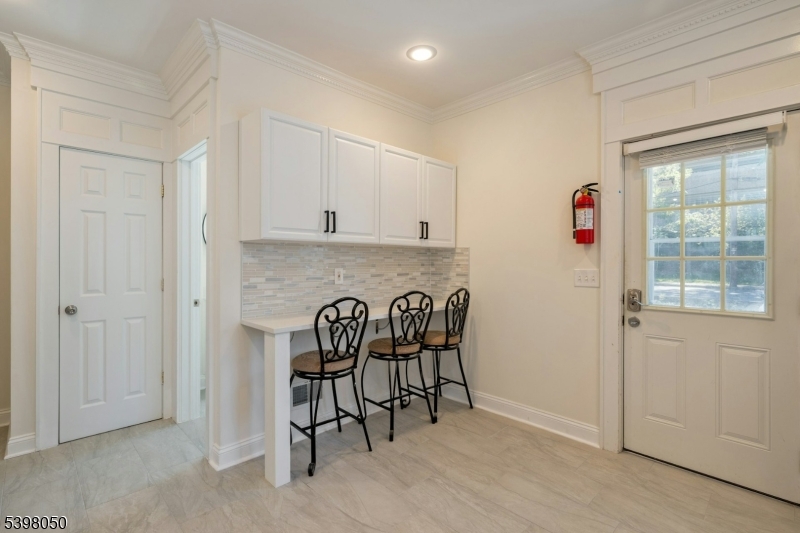 16 Walnut Street Summit, NJ 07901 - Photo 11 of 24 a view of a livingroom with furniture and window
