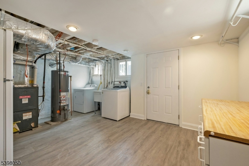 16 Walnut Street Summit, NJ 07901 - Photo 24 of 24 a view of a hallway with wooden floor and closet