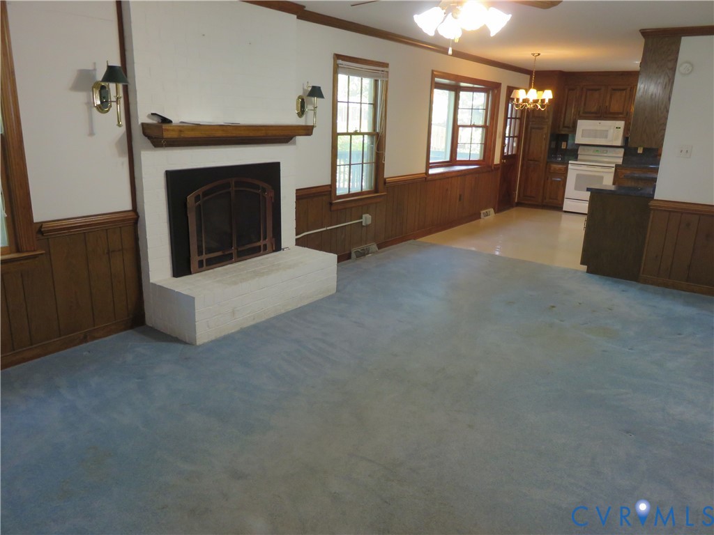 8379 Quailfield Road Mechanicsville, VA 23116 - Photo 28 of 56 a view of a livingroom with a fireplace