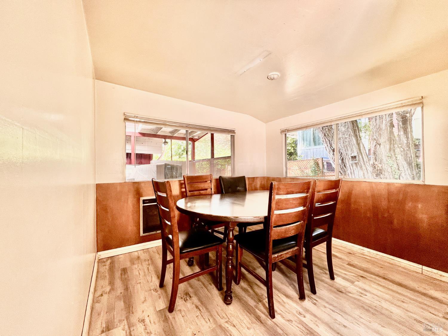 308 Coast Street Willits, CA 95490 - Photo 13 of 23 a view of a dining room with furniture and wooden floor