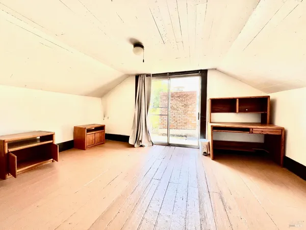 a bathroom with a sink and a shower