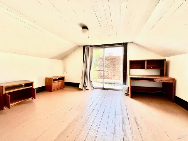 a bathroom with a sink and a shower