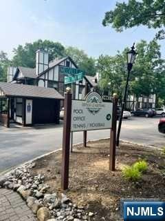 1417 Faulkner Court Mahwah, NJ 07430 - Photo 2 of 7 a view of a street with a park