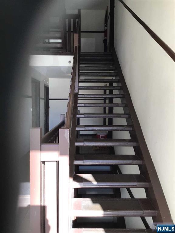 1417 Faulkner Court Mahwah, NJ 07430 - Photo 7 of 7 a view of entryway and hall with wooden floor