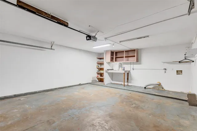 a view of a livingroom with a furniture and staircase