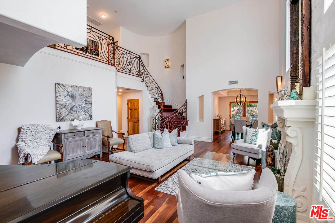 4520 Tyrone Avenue Sherman Oaks, CA 91423 - Photo 11 of 61 a living room with furniture and a fireplace