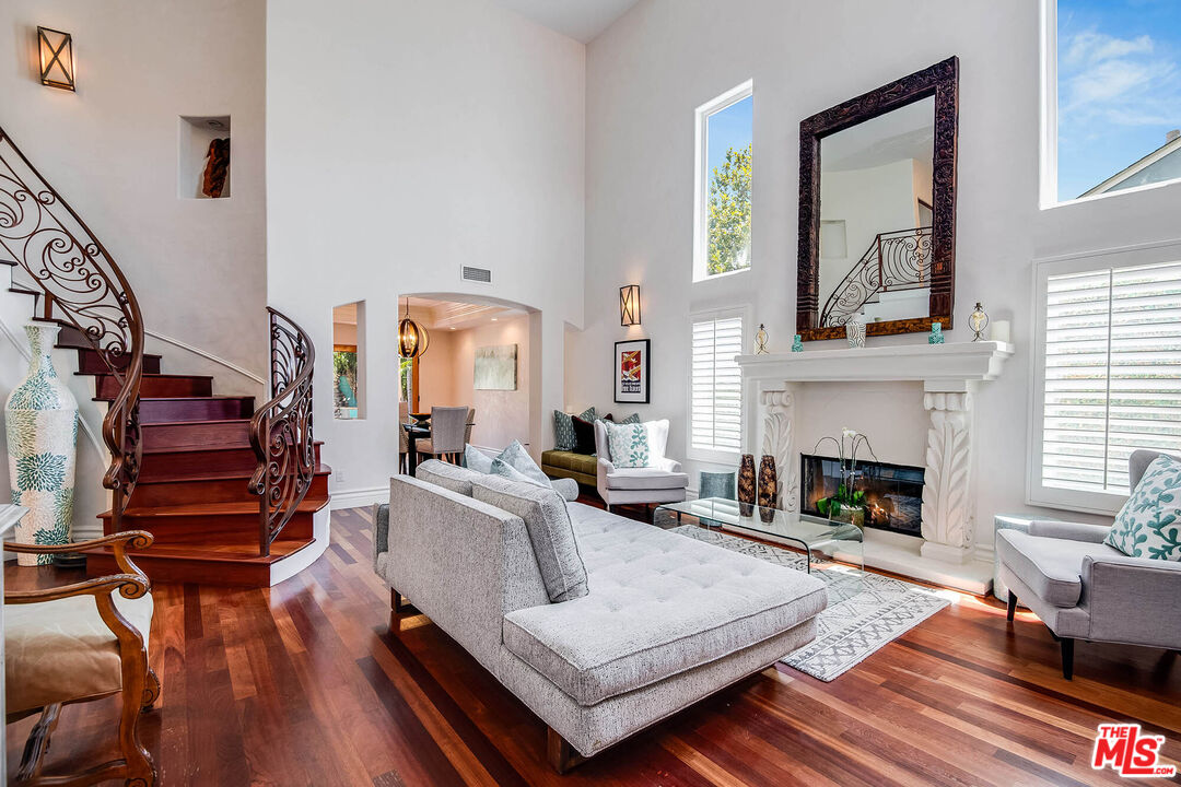 4520 Tyrone Avenue Sherman Oaks, CA 91423 - Photo 12 of 61 a living room with furniture fireplace and wooden floor
