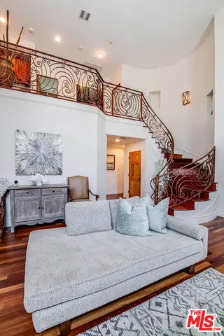 a view of a backyard with sitting area