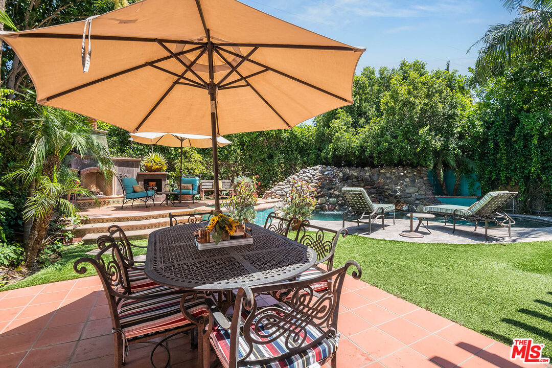 4520 Tyrone Avenue Sherman Oaks, CA 91423 - Photo 21 of 61 a view of backyard with swimming pool and patio