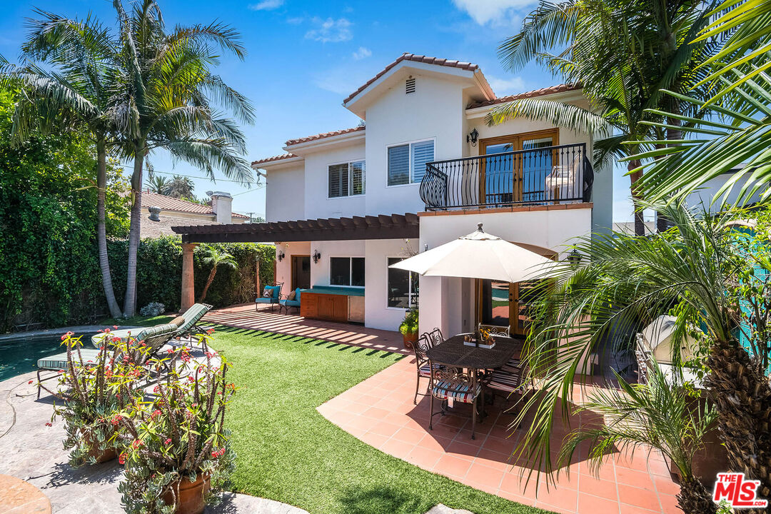4520 Tyrone Avenue Sherman Oaks, CA 91423 - Photo 24 of 61 a view of a house with backyard sitting area and swimming pool