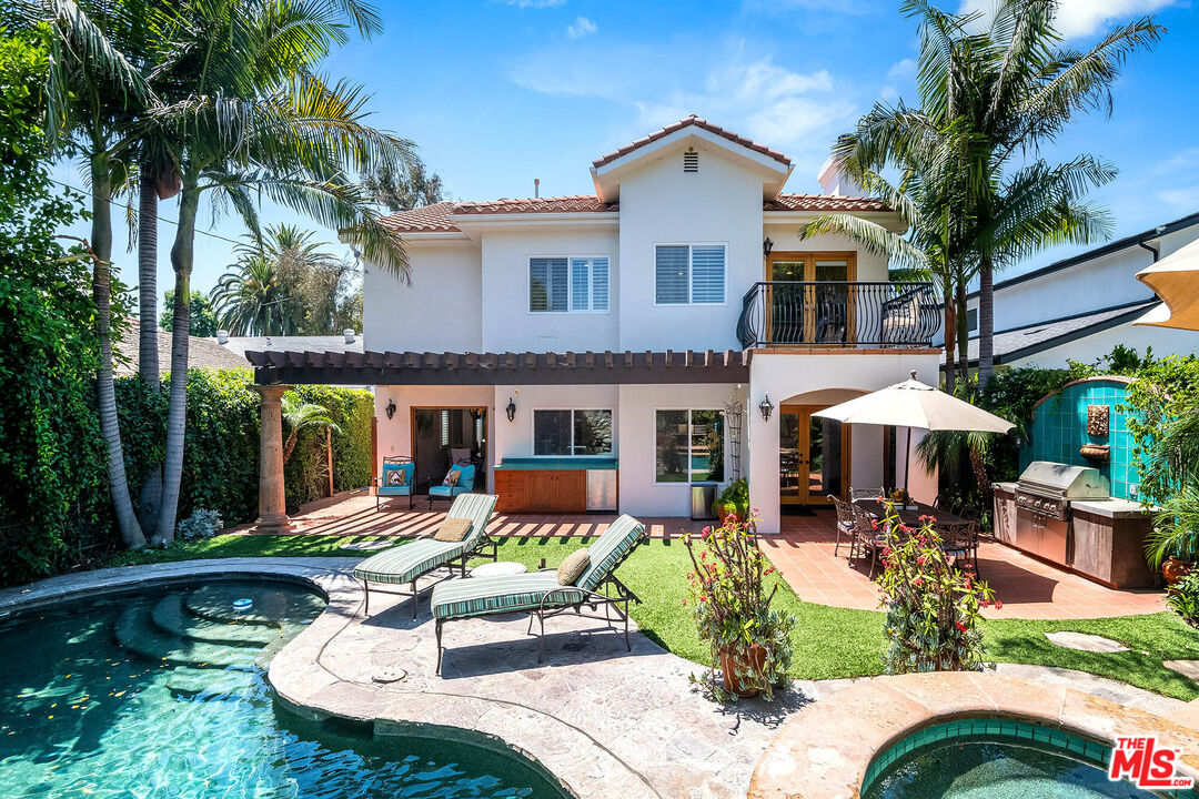 4520 Tyrone Avenue Sherman Oaks, CA 91423 - Photo 26 of 61 a view of a house with backyard sitting area and swimming pool