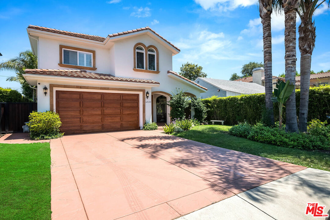 4520 Tyrone Avenue Sherman Oaks, CA 91423 - Photo 3 of 61 a front view of a house with garden