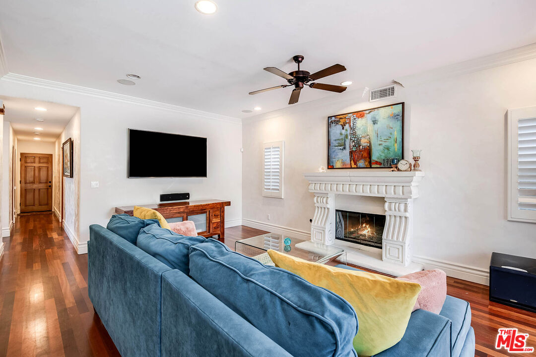 4520 Tyrone Avenue Sherman Oaks, CA 91423 - Photo 35 of 61 a living room with furniture and a flat screen tv