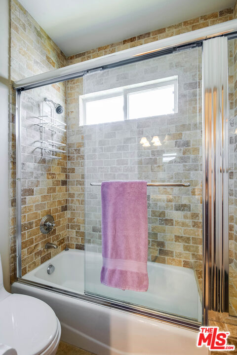 4520 Tyrone Avenue Sherman Oaks, CA 91423 - Photo 52 of 61 a bathroom with a bathtub and shower