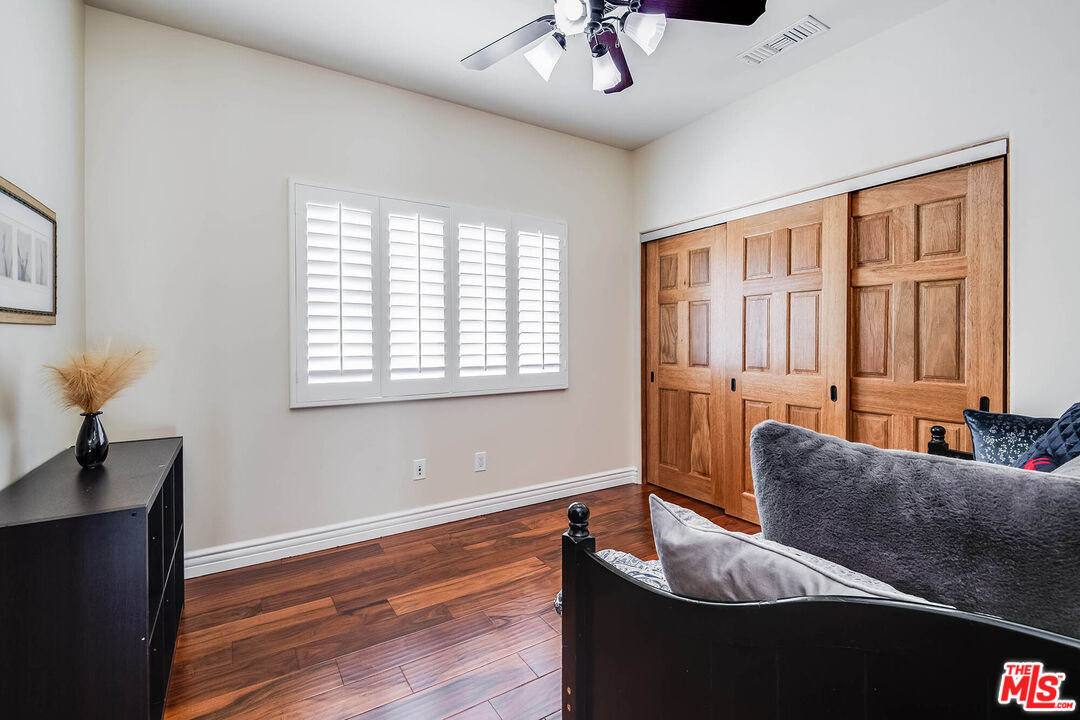 4520 Tyrone Avenue Sherman Oaks, CA 91423 - Photo 53 of 61 a living room with furniture and a window