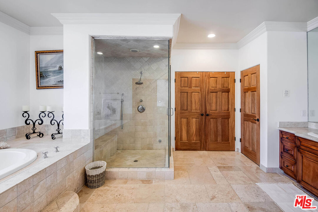 4520 Tyrone Avenue Sherman Oaks, CA 91423 - Photo 58 of 61 a bathroom with a granite countertop sink a toilet and shower
