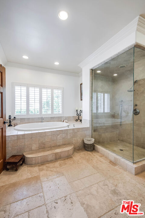 4520 Tyrone Avenue Sherman Oaks, CA 91423 - Photo 59 of 61 a bathroom with a tub and shower