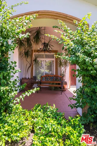 a view of a house with a garden