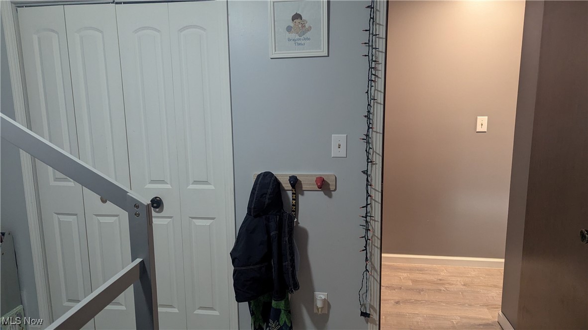 290 Leatherman Road Wadsworth, OH 44281 - Photo 19 of 43 Bedroom light wood-style floors and baseboards
