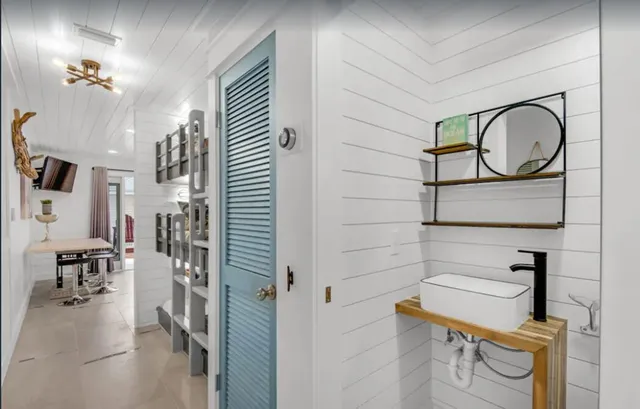 a view of living room and wooden floor
