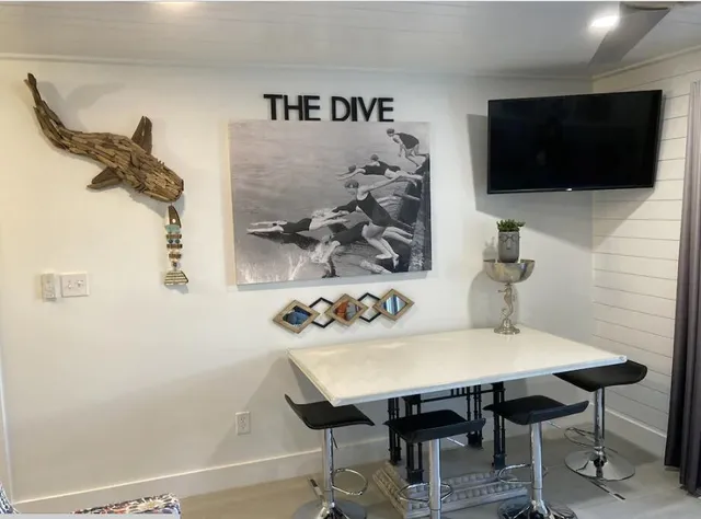 a view of a workspace with furniture