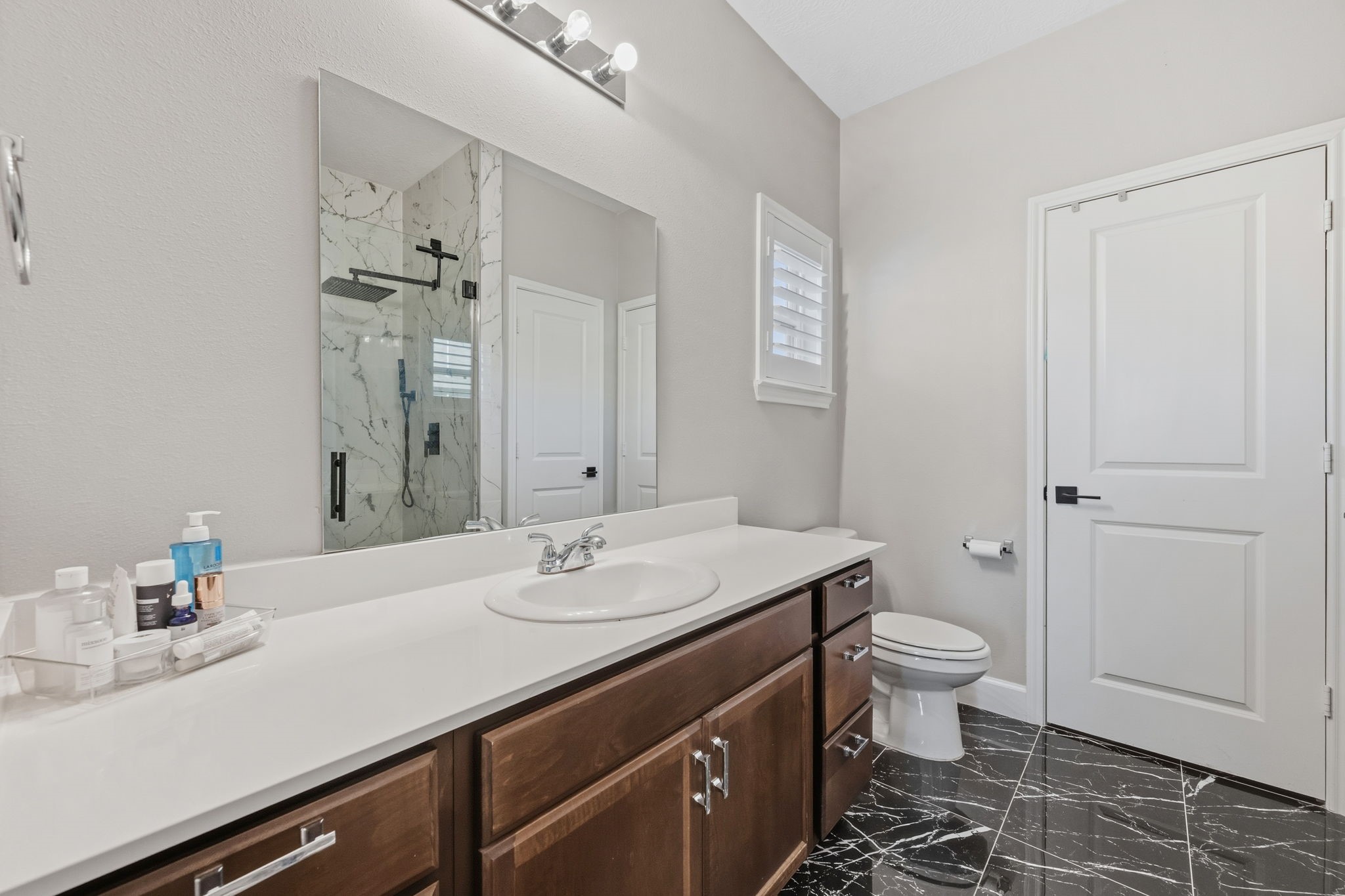 727 Road 5105 Cleveland, TX 77327 - Photo 12 of 22 a bathroom with a sink a toilet and shower