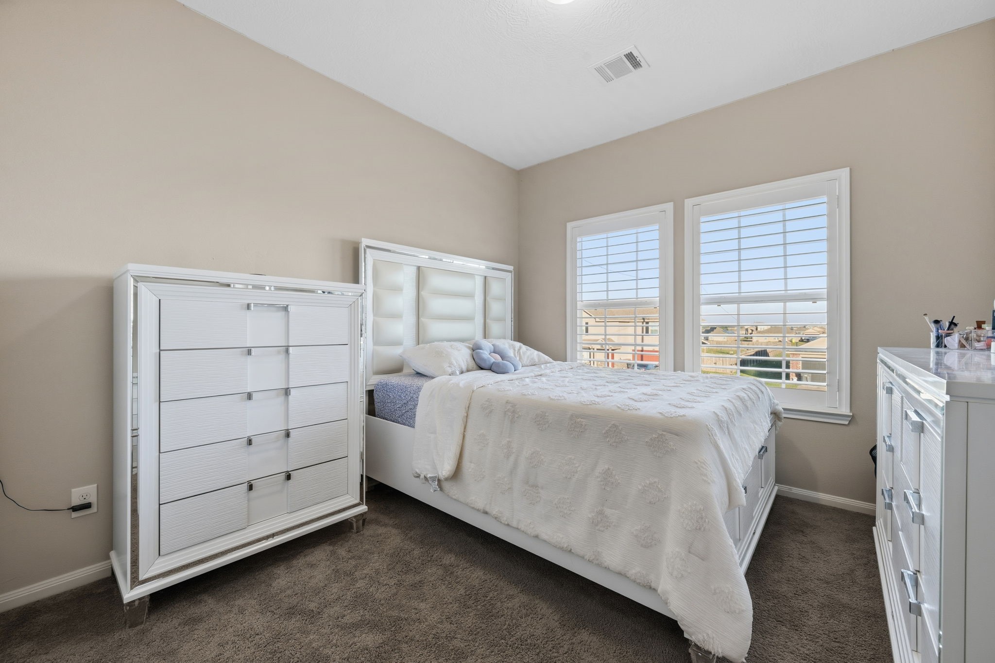 727 Road 5105 Cleveland, TX 77327 - Photo 14 of 22 a spacious bedroom with a bed and a window