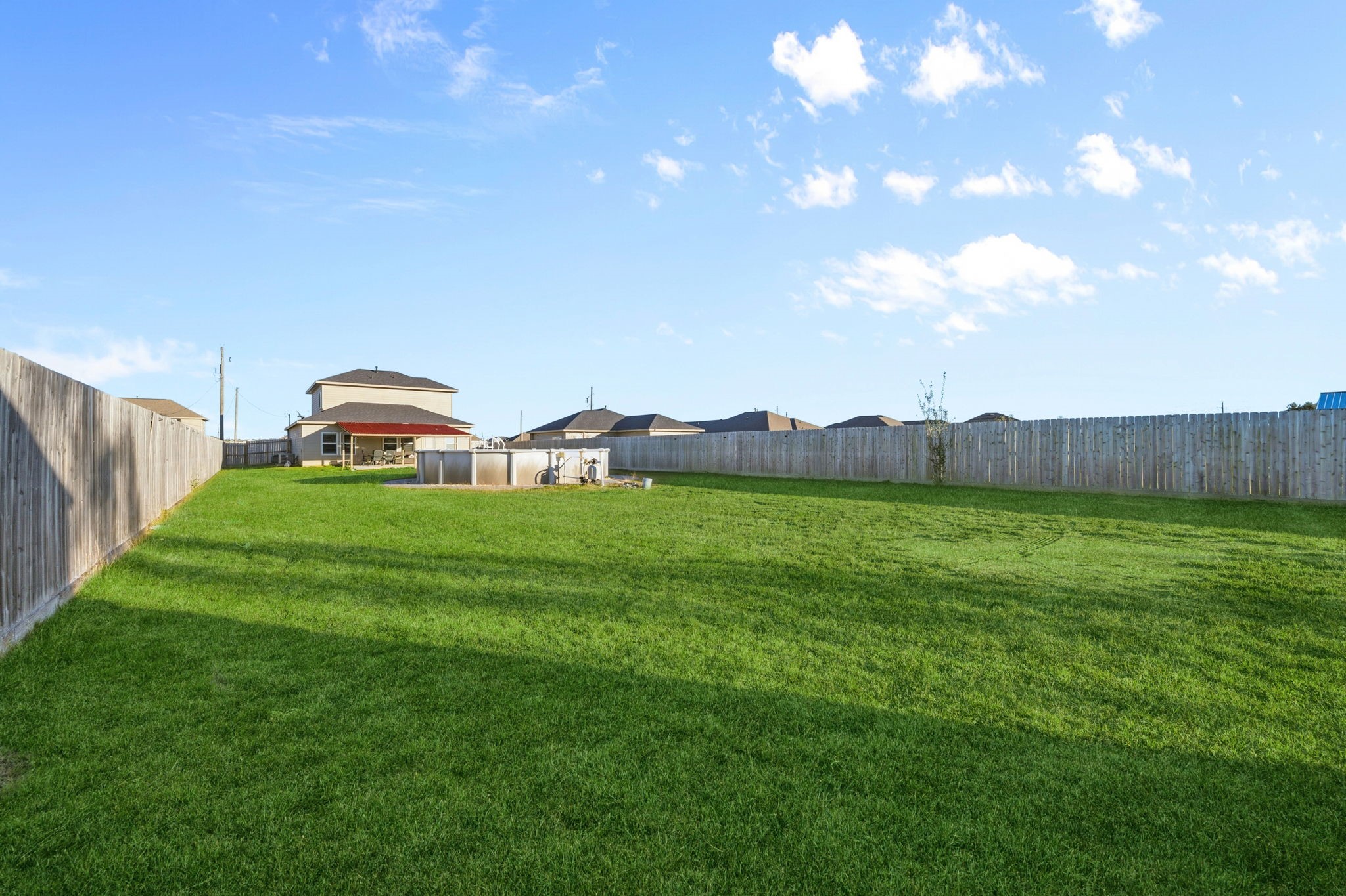 727 Road 5105 Cleveland, TX 77327 - Photo 20 of 22 a view of a garden with houses
