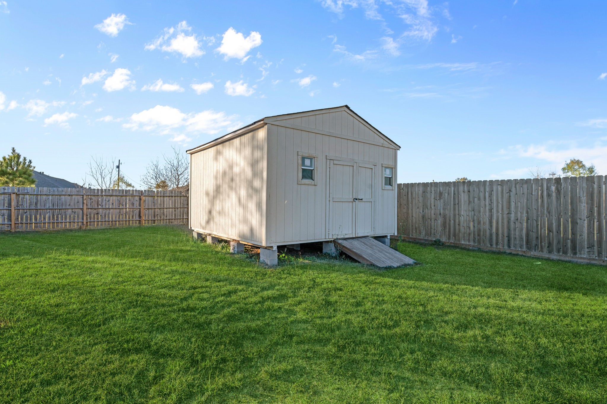 727 Road 5105 Cleveland, TX 77327 - Photo 22 of 22 a view of a backyard