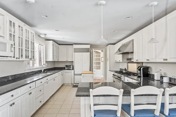 a large kitchen with cabinets
