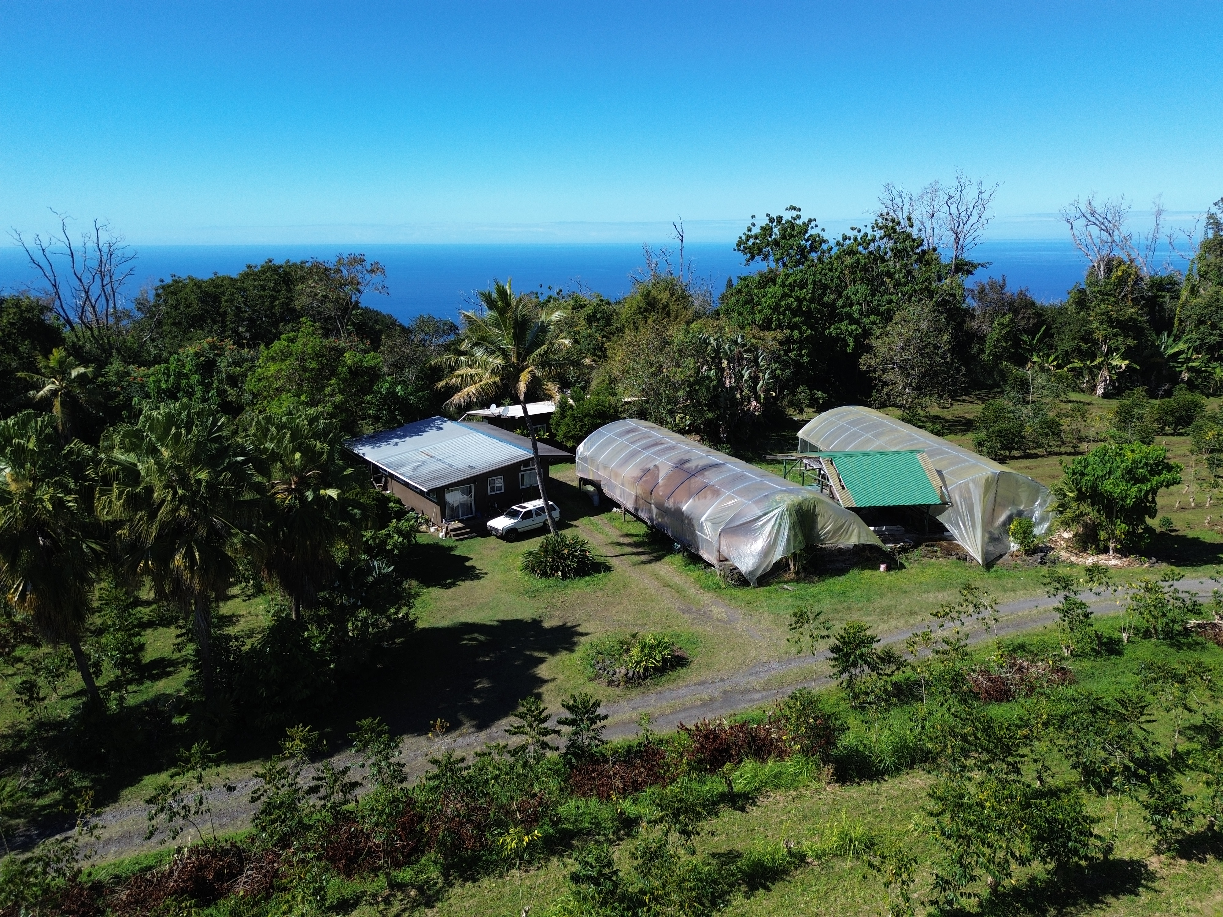 78-1337 Bishop Road Holualoa, HI 96725 - Photo 7 of 15 an aerial view of a house with garden space and street view