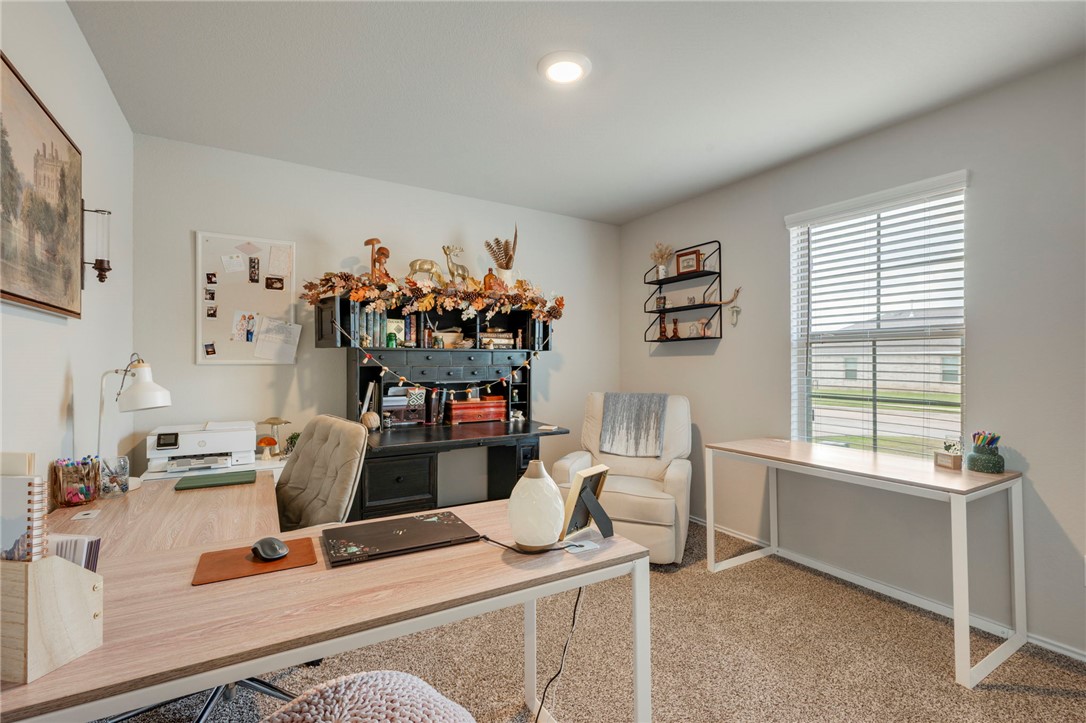 8026 Front Nine Lane Navasota, TX 77868 - Photo 13 of 22 a work room with furniture and window