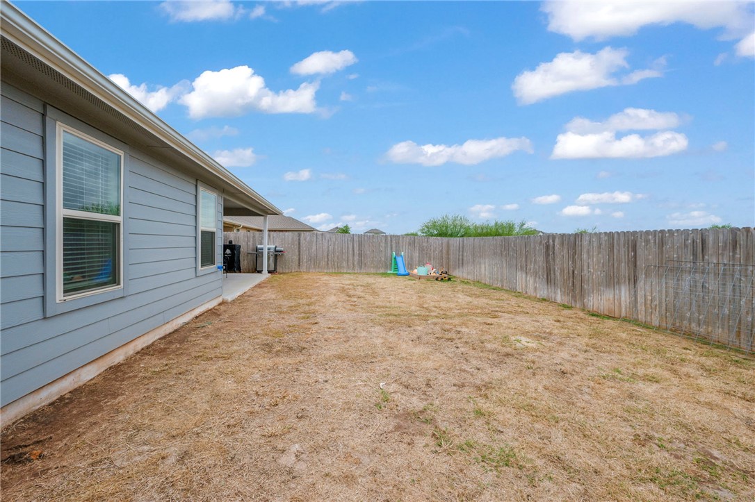 8026 Front Nine Lane Navasota, TX 77868 - Photo 17 of 22 a view of a backyard