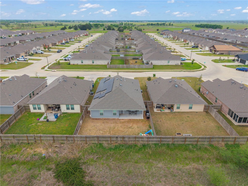 8026 Front Nine Lane Navasota, TX 77868 - Photo 21 of 22 an aerial view of residential houses with outdoor space