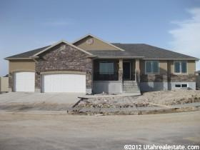 5875 South 4584th Street West Hooper, UT 84315 - Photo 1 of 1 Exterior (garage doors not painted yet.)