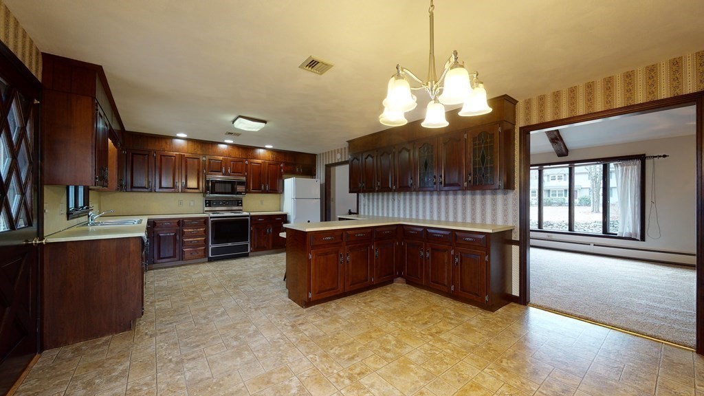 91 Dodge Hill Road Sutton, MA 01590 - Photo 11 of 42 a kitchen with lots of counter top space