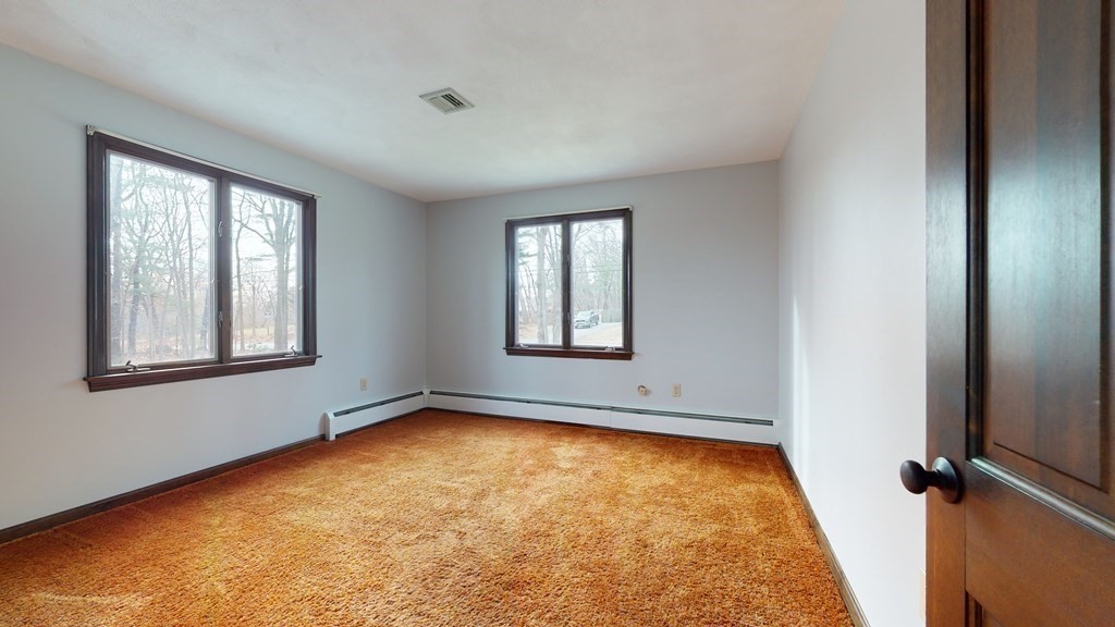91 Dodge Hill Road Sutton, MA 01590 - Photo 20 of 42 an empty room with windows