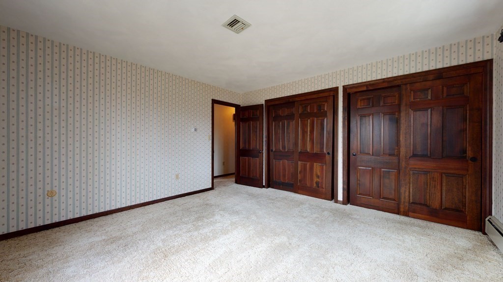 91 Dodge Hill Road Sutton, MA 01590 - Photo 23 of 42 a view of an empty room with closet area