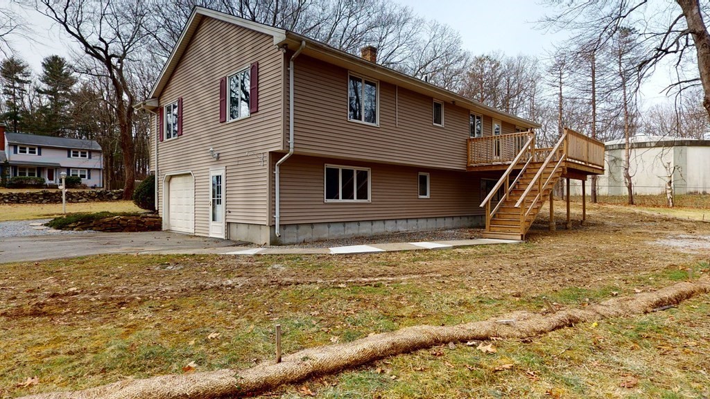 91 Dodge Hill Road Sutton, MA 01590 - Photo 5 of 42 a view of a house with a yard